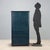 1980s wooden chest of drawers produced by Roberti Rattan, featuring a functional design and a blue teal finish. The...