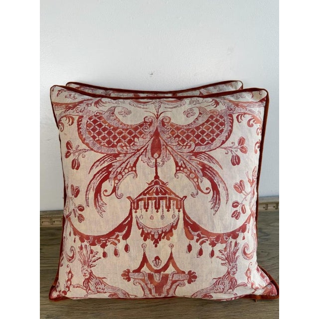 A beautifully tailored pair of decorative pillows crafted from authentic Fortuny “Mezzano” printed cotton, one of the...
