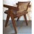 DETAILS This single mid-century modern armchair is crafted of solid teak with a raked, low caned backrest, square caned...