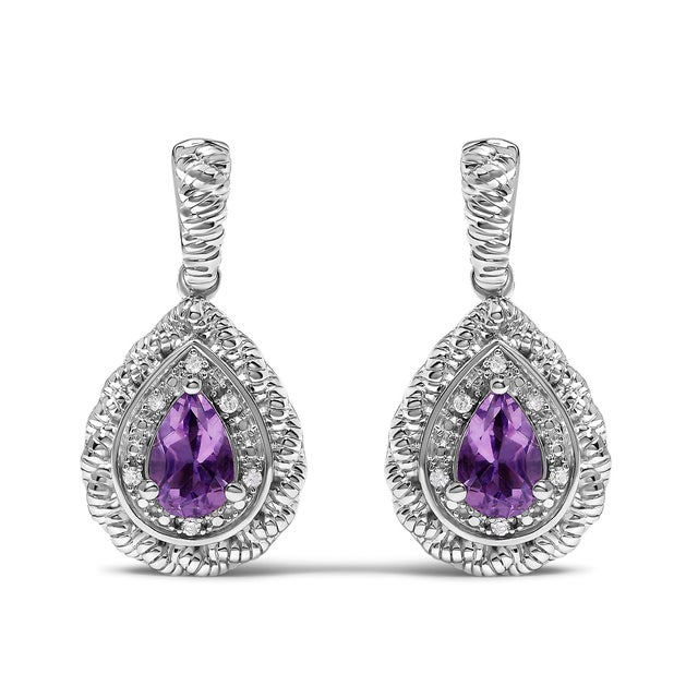 Elegance cascades into the realm of wearable art with these exquisite .925 sterling silver drop earrings, where the allure...