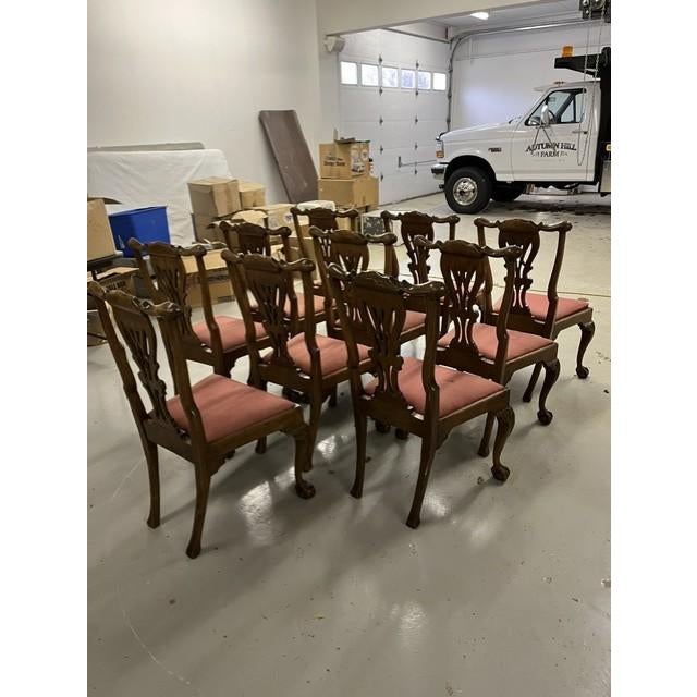 This is a set of ten late 1700s Irish Chippendale Hand Carved Walnut dining room side chairs. They were brought over from...