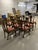 This is a set of ten late 1700s Irish Chippendale Hand Carved Walnut dining room side chairs. They were brought over from...
