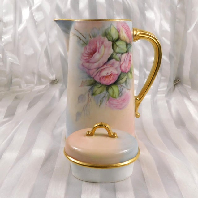 This Is a signed Charles Field Haviland and Gerard Dufraisseix and Morel coffee pot in pink with pink flowers and gold...