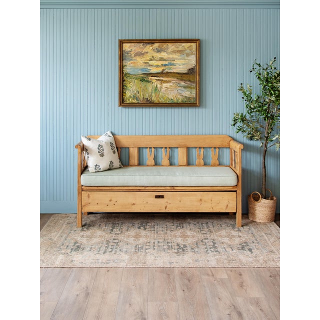 A charming 19th-century Continental pine hall settle or daybed, constructed in warm honey-toned pine and retaining a...