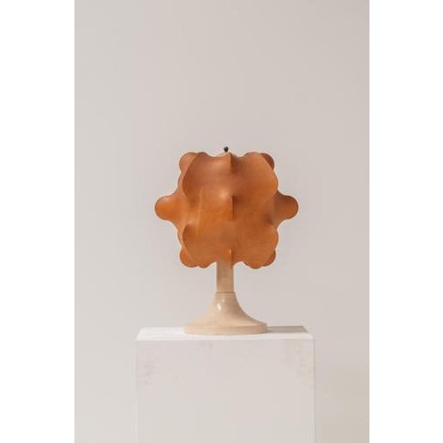 A striking and sculptural cocoon table lamp made in Italy during the 1970s, crafted in the distinctive style associated...