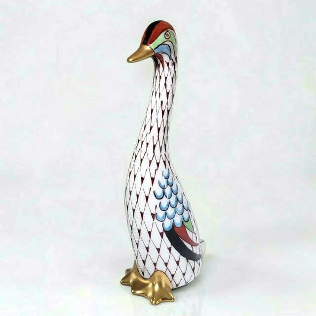 Add a touch of elegant Hungarian porcelain artistry to your collection with this **Vintage Mid-Century Modern Hollóháza...