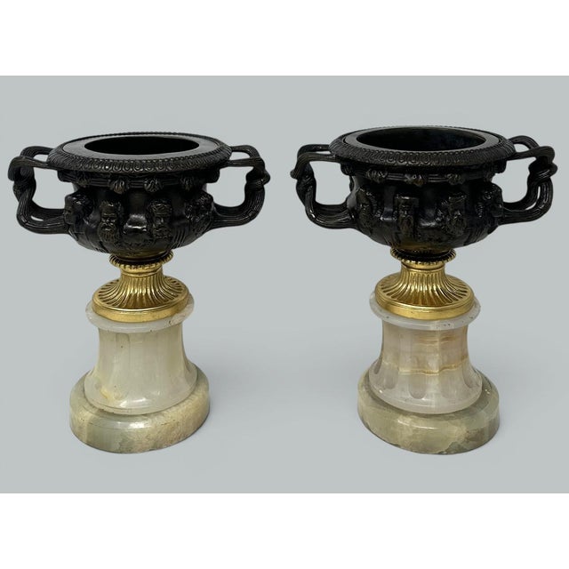Superb example of a pair of French ormolu and bronze chisel cast models of the Warwick Albani vase of outstanding quality,...