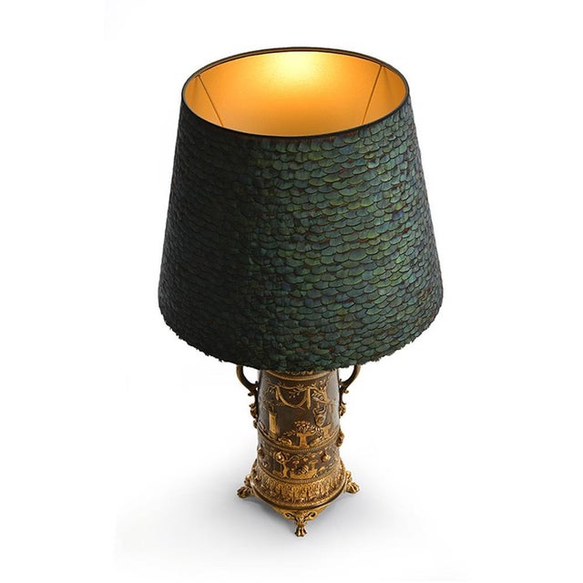XIXth century oil lamp in gilded bronze and tailor-made lampshade. This piece is designed in the style of the selected...
