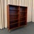 This Scandinavian Modern bookcase display cabinet was designed by Gunni Omann for the family furniture company Omann Jun...