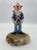 Celebrate the whimsical artistry of acclaimed American sculptor Ron Lee with this signed 1984 Dentist Clown sculpture, an...
