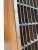 Mid-Century wooden industrial storage or display cubbies. Narrow triangular shape with many slots. An American industry...