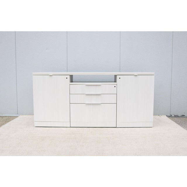Fabulous modern minimalist style Reff Profiles classic credenza or sideboard in whitened ash laminates by Knoll. The Reff...