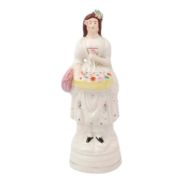 Early 20th Century English Porcelain Decorative Object Depicting Lady With a Floral Basket For Sale