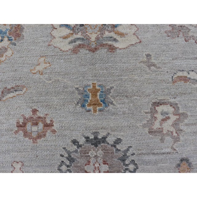 2020s Floral Modern Oushak With Muted Gray Background and Cream Border For Sale - Image 5 of 13