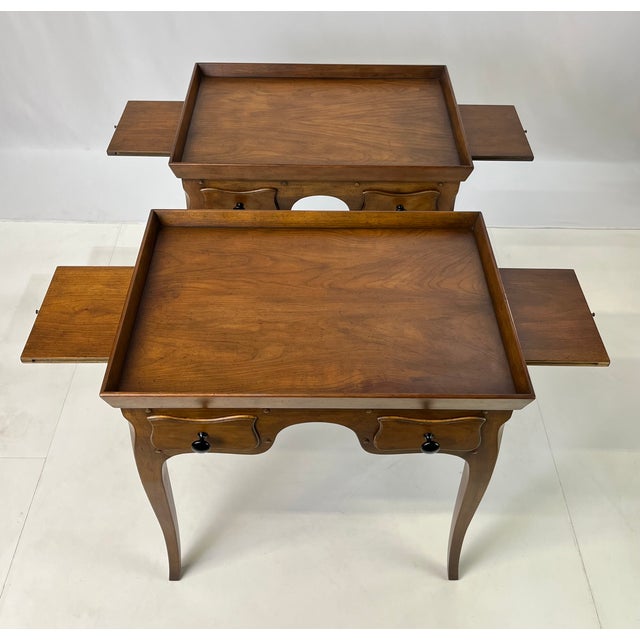 Add a sophisticated, collected look to your interior with this pair of vintage fixed tray-top side tables by Baker...