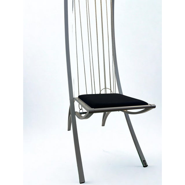 Postmodernist dining chair "Harp", designed by Dietrich Design. The chair feature very sculptural form with extremely tall...