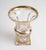 A handsome cut crystal vase in classic urn form, featuring a flared, scalloped rim edged in gold, a diamond-cut lower body...
