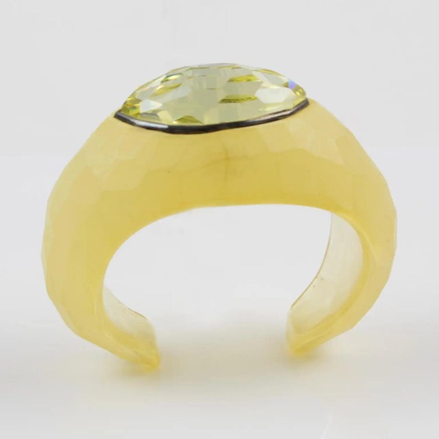 Designed by celebrated fashion artist Aline Gui for Daniel Swarovski Paris, this exceptional cuff bracelet showcases bold...