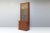 Cupboard base with single door glazed bookcase top in original paint finish.