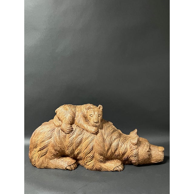 ITEM NAME: Vinatge Hand Carved Wooden Bear and A Cub Sculptural Figure ORIGIN: Philippines AGES: Late 20th Century...