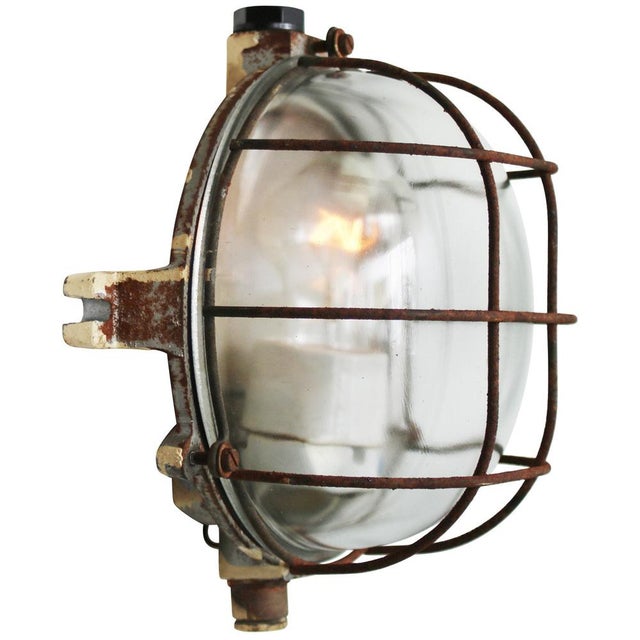 French industrial wall / ceiling lamp cast iron back with clear glass. e27 / e26. Depending on destination, all our lights...