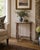 A handsome Federal side table crafted in walnut and painted in an antiqued red and cream. The elegant turned legs create a...