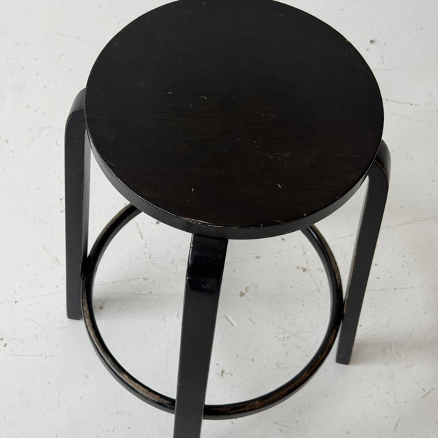 c. 2012. Finland. Black wood frames, from the Apple Store.