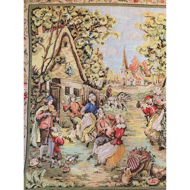 Bring effortless character to your space with this vibrant jacquard loom wall tapestry depicting a classic fête champêtre...