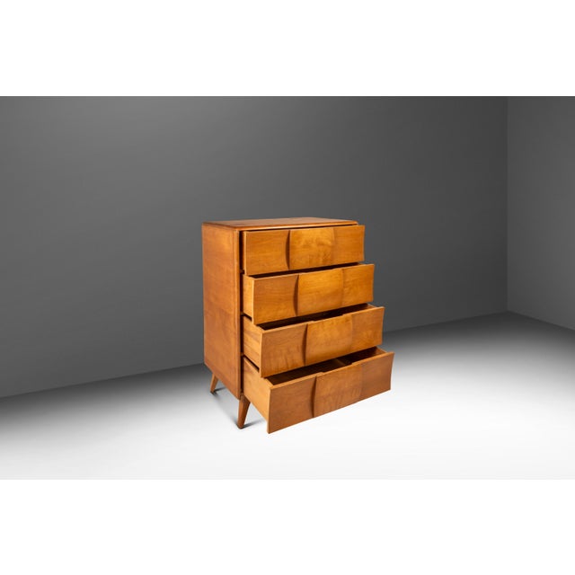 Introducing a rare, untouched four-drawer tall boy dresser by Heywood-Wakefield stamped "1952". Constructed from solid...