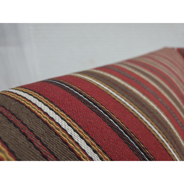 1960s, Danish 2-seater sofa. Original striped red/multicolor furniture wool, oak wood legs, brass springs in the seat....