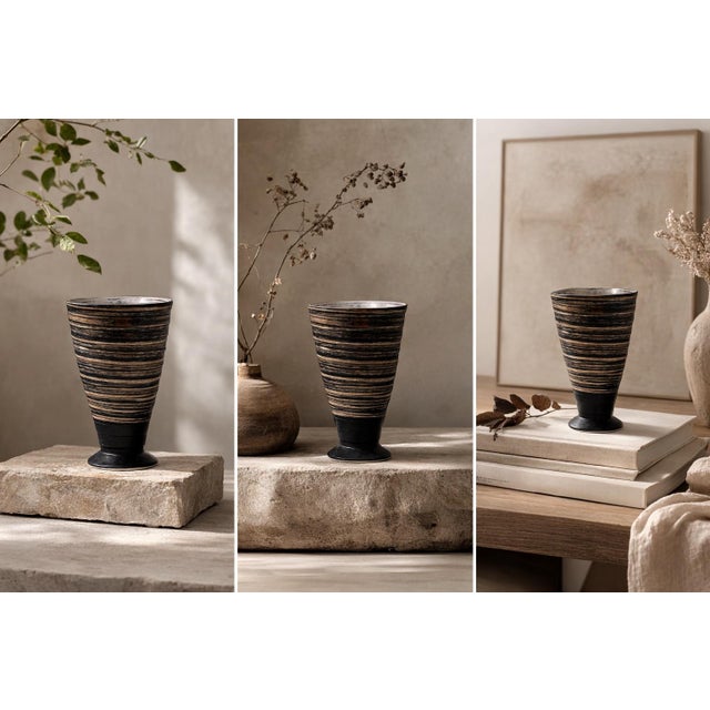 A striking vintage Japanese ceramic drinking vessel attributed to Arita ware, featuring a tall tapered form, pedestal...