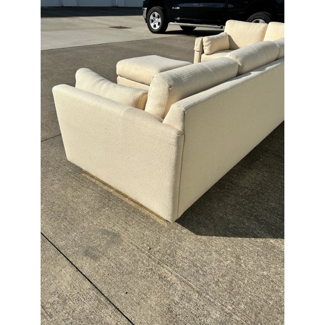 1970's Cream Wool Sectional Sofa on Polished Brass Plinth Base With Ottoman For Sale - Image 12 of 17