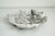 Vintage 9" wide shallow bowl crafted in Italy, circa 1950s. Made of carved alabaster formed in a stylized leaf shape. The...