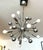 Spectacular large Italian Space Age chandelier, attributed to Goffredo Reggiani, crafted from chromed metal and composed...