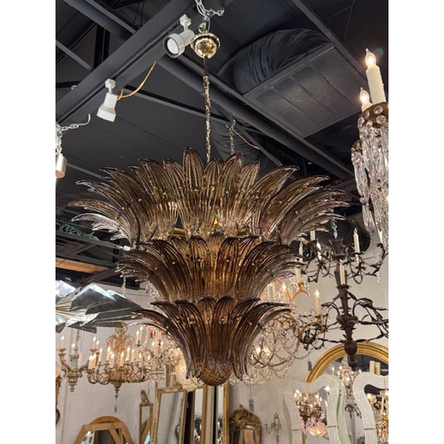 Lovely modern Palmette Murano glass chandelier in a tobacco "fume" color. A striking fixture that makes a real impact!! 24...