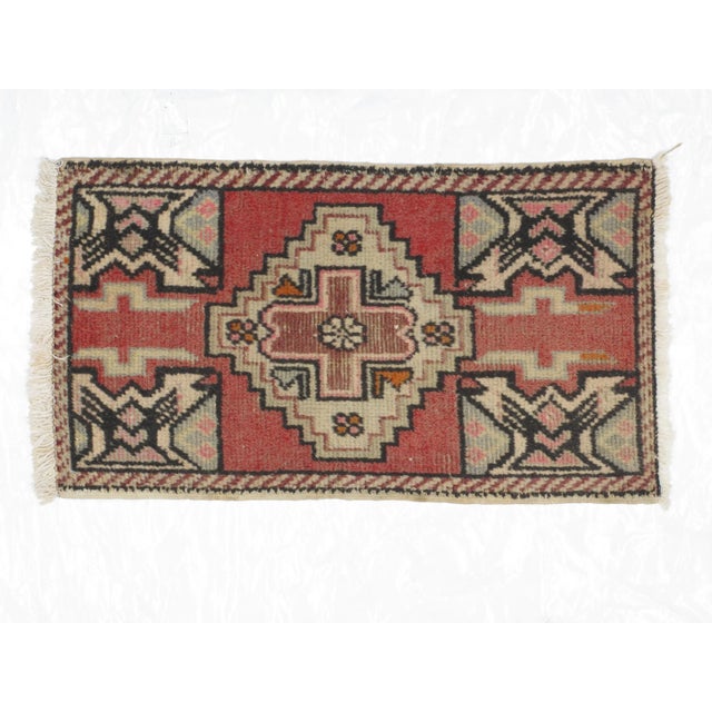 Wool on wool pile genuine handmade vintage Turkish Yastik rug. The piece is from the 1960s.