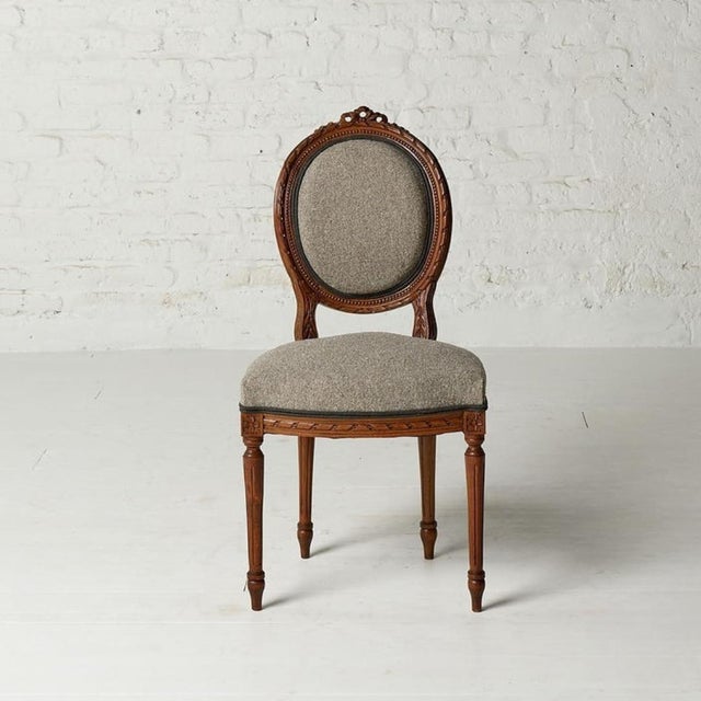 This charming 19th Century French Boucle & Walnut Petite Chair beautifully blends timeless French elegance with refined...
