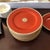 Ceramic 1970s Fitz and Floyd Medaillon d'Or Orange Terra Cotta Plates and Platter - Set of 13 For Sale - Image 7 of 9