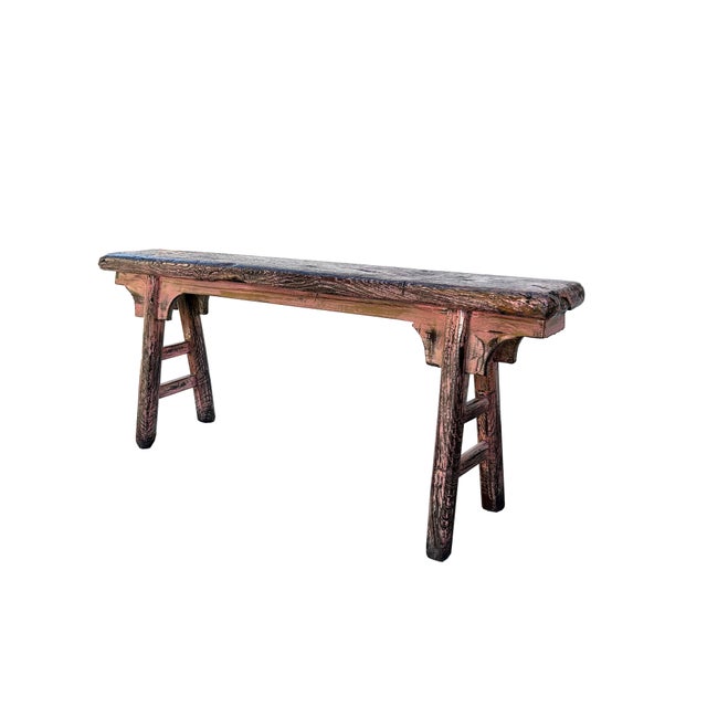 This rustic wooden bench exudes a timeless charm with its weathered, distressed appearance. Crafted from solid wood, the...