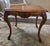 French Accent Table with beautiful warm finish and highly detailed carvings. Slender cabriole legs and sculped edge. ....