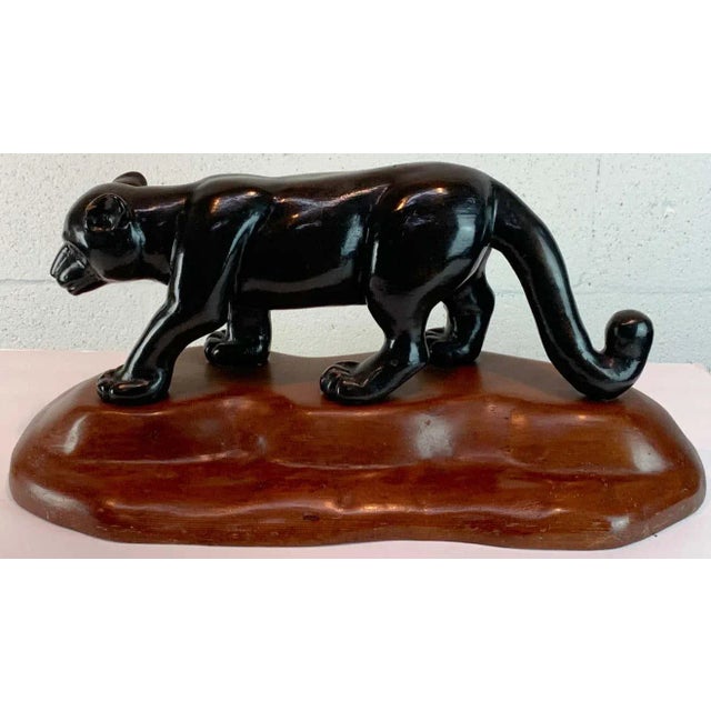 French modern carved wood sculpture of black panther/ jaguar, well carved ebonized walking black panther/ jaguar on a...