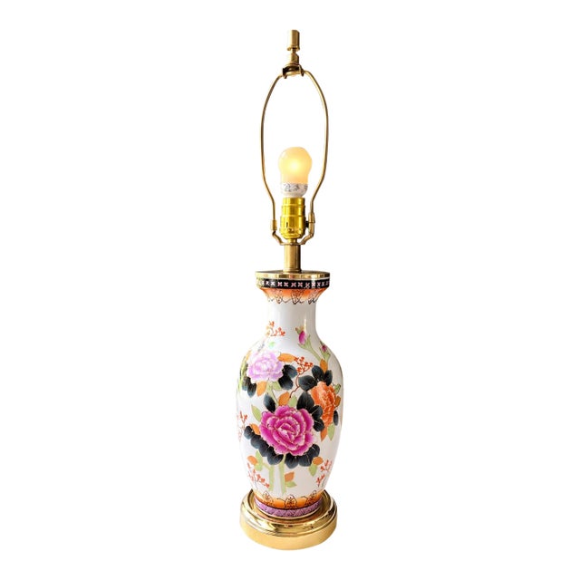 Vintage Chinoiserie Porcelain Table Lamp, Hand-Painted Floral Motif, Gold Accents, Ornate Brass Details, Traditional Asian-Inspired Decor For Sale