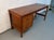 Add timeless Scandinavian style to your workspace with this Mid-Century Modern Danish teak writing desk. Beautifully...