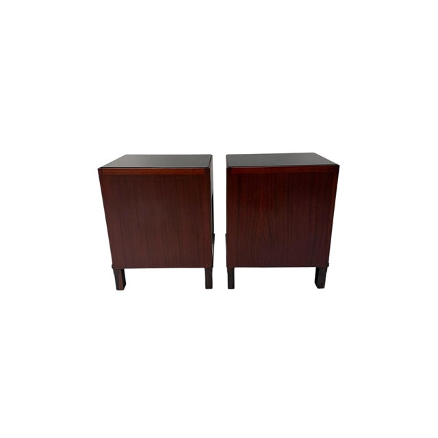 Magnificent and rare pair of Art Deco Modernist nightstands or bedside tables. Design by Max Coini, Amsterdam. Striking...