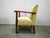 An elegant Art Deco armchair produced in Czechoslovakia between 1935 and 1945, showcasing the refined craftsmanship and...