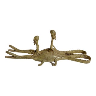Vintage Dogon Bronze Sculpture of Ancestors Riding Two Crocodiles , Mali For Sale