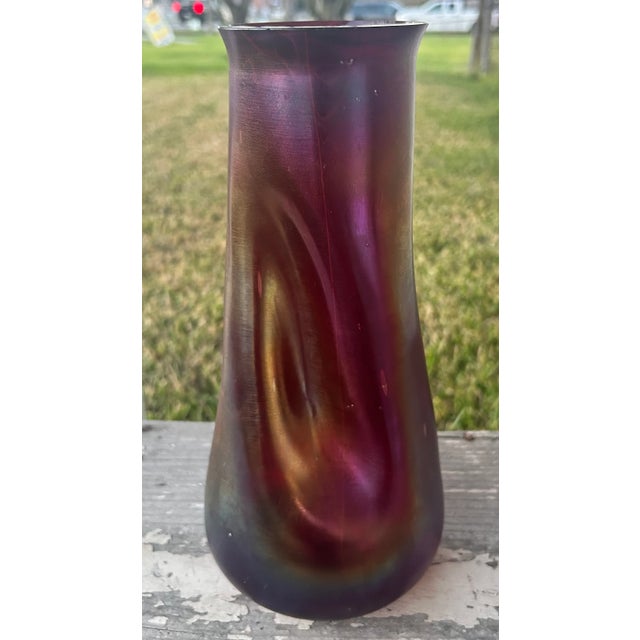 Up for sale is a Circa 1900 Bohemian Josef Rindskopf Art Nouveau Iridescent Ruby Red Glass Striated Twist Vase! It...