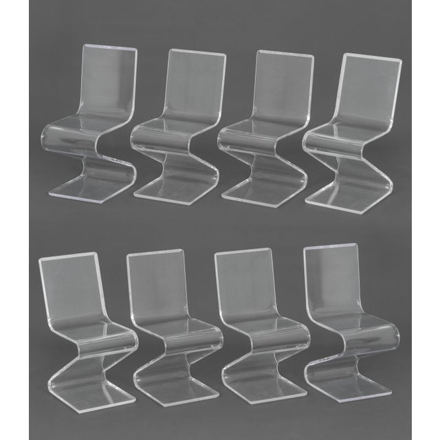 Set of Eight Mid-Century Modern Style Clear Acrylic "Z" Dining Chairs, with beveled edges. 34.5" H x 16" W x 20.5" D;...