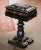 Richly decorated with shimmering mother-of-pearl inlay and delicate gilt ornamentation, this antique Victorian sewing...