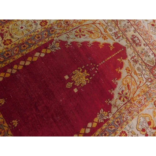 An attractive and decorative antique Turkish prayer rug. A collectors item. Circa early 1900's. Wool pile on cotton...